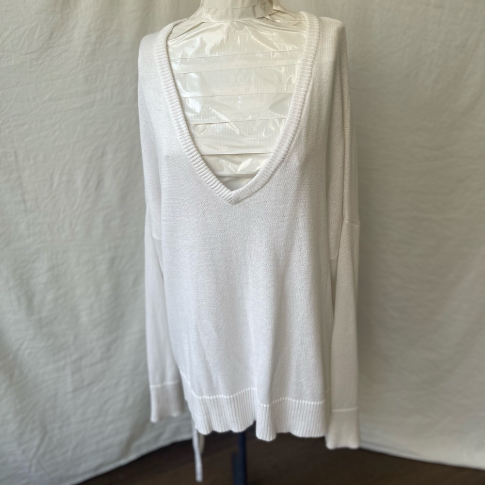 White BCBG Generation Sweater with tie side details. Sz L